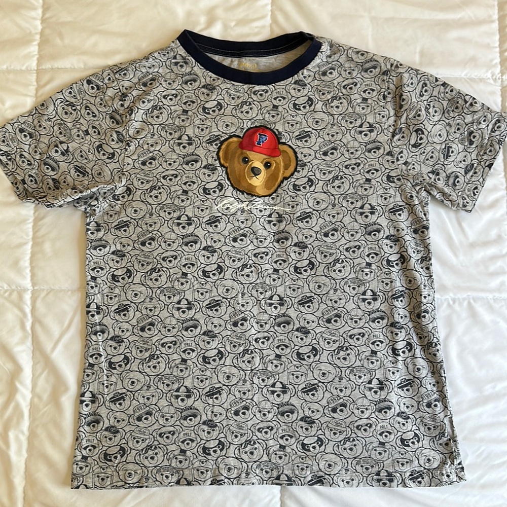 Polo shirt with bear logo rarely used, in good condition
